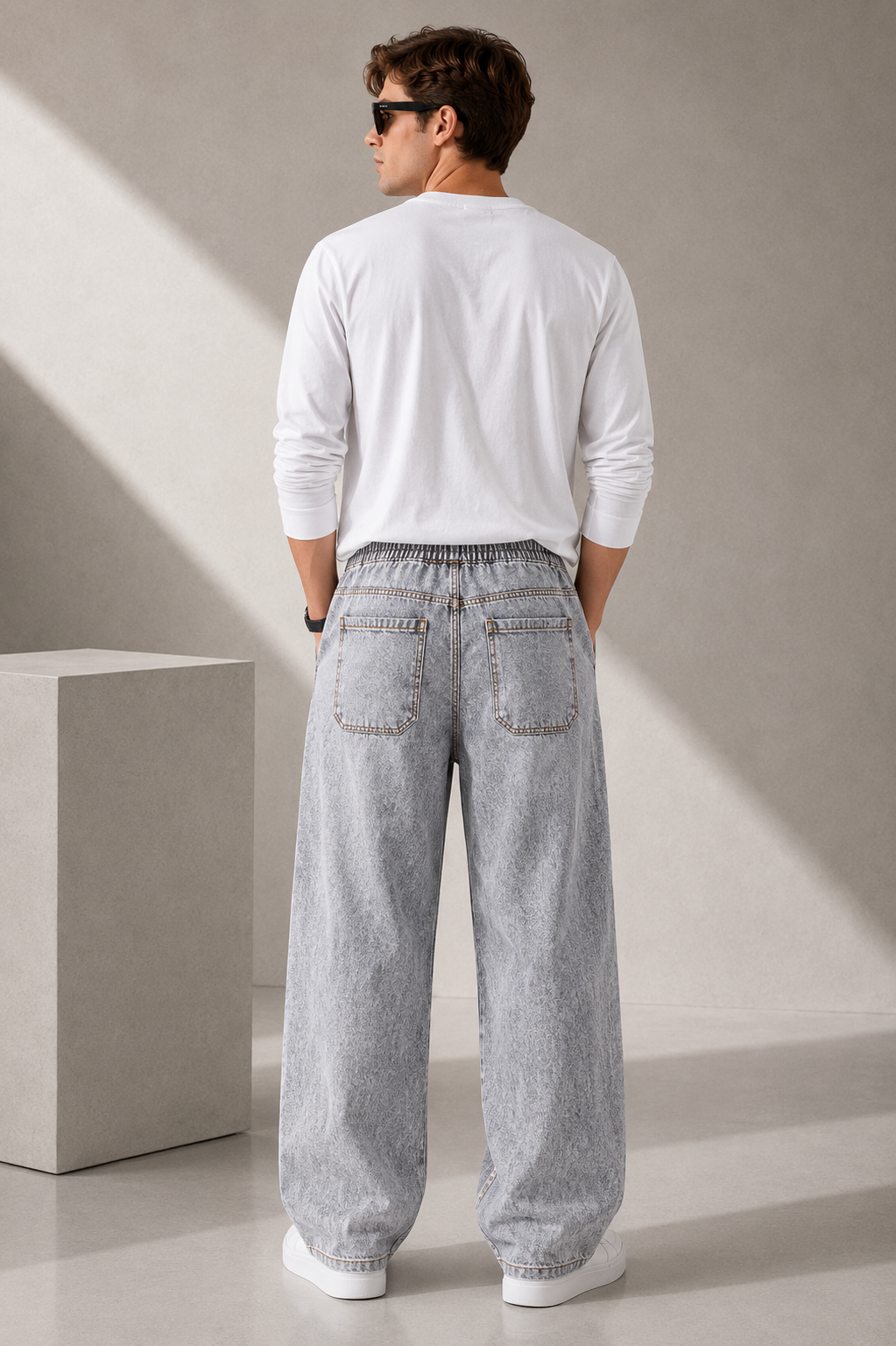 Men's Storm Grey wide leg baggy denim jeans with large front pockets and detailed stitching back side