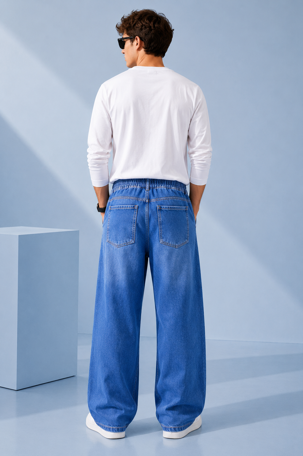 Nivora Men's Mid Blue Baggy Denim Jeans showing wide-leg fit, big pocket design and Viscor spray detailing Back side 